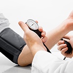 man checking blood pressure