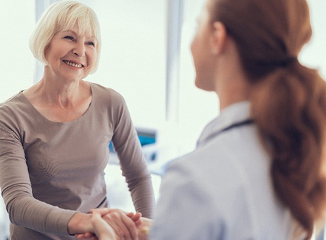 Woman discussing sleep apnea with doctor in Dallas