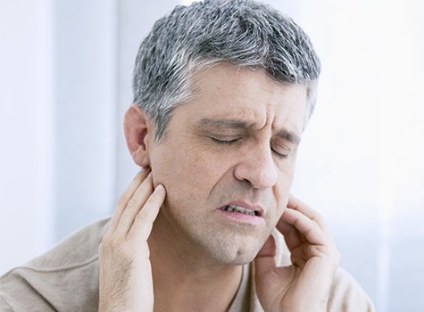 man upset about grinding teeth