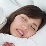 woman grinding teeth