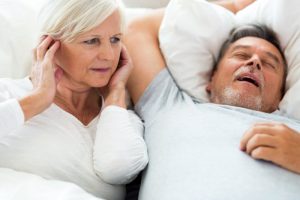 aging couple struggling with sleep apnea