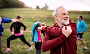 man in a group about to exercise